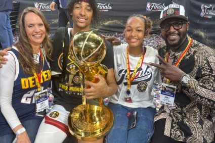 Naji’s photo of holding the championship trophy: all honors come from the highest blessing.